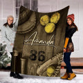 Rustic wood fastpitch softball equipment blanket held upright by models outdoors