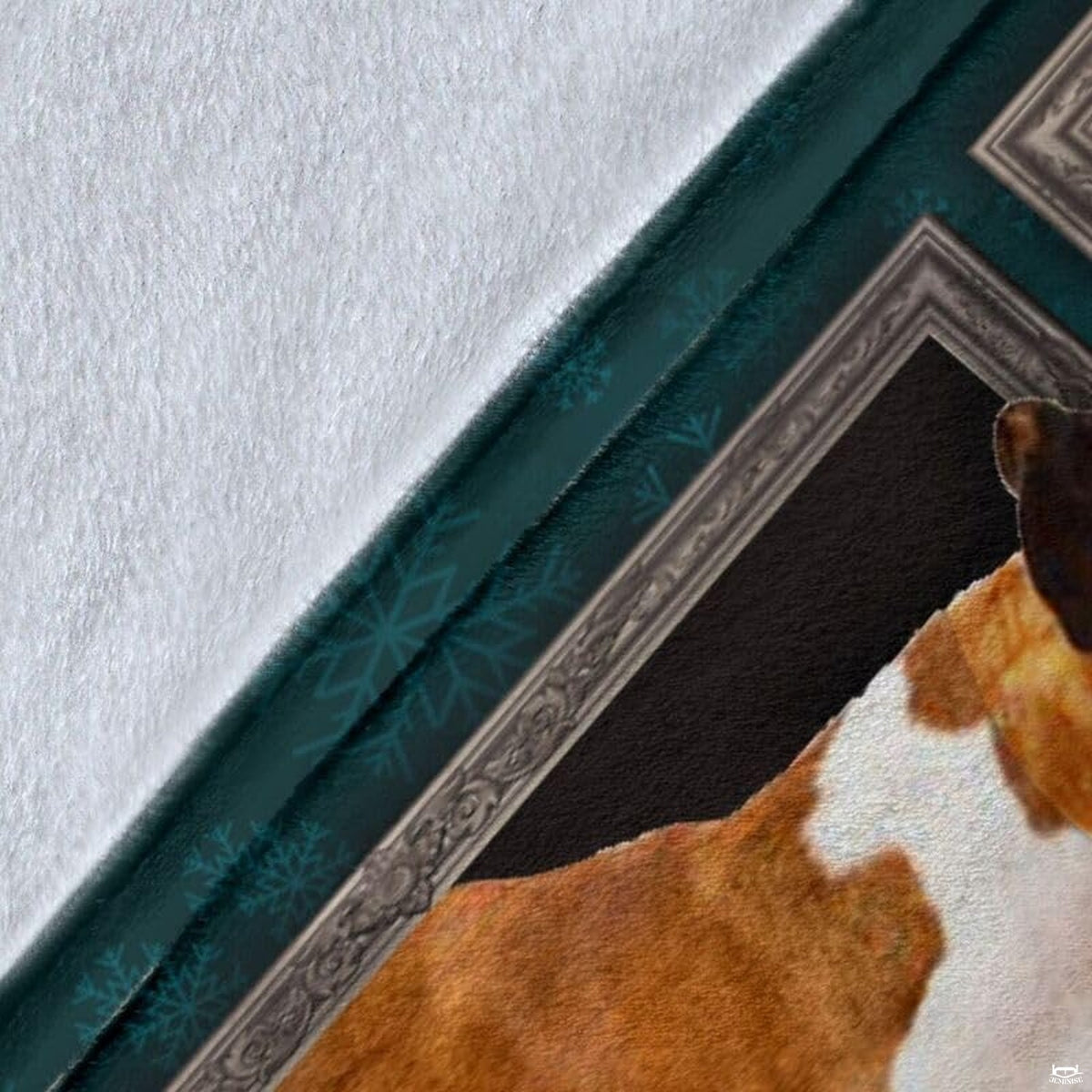 Close-up detail shot of the Fawn Boxer Dog blanket showing edge detail and teal snowflake art.