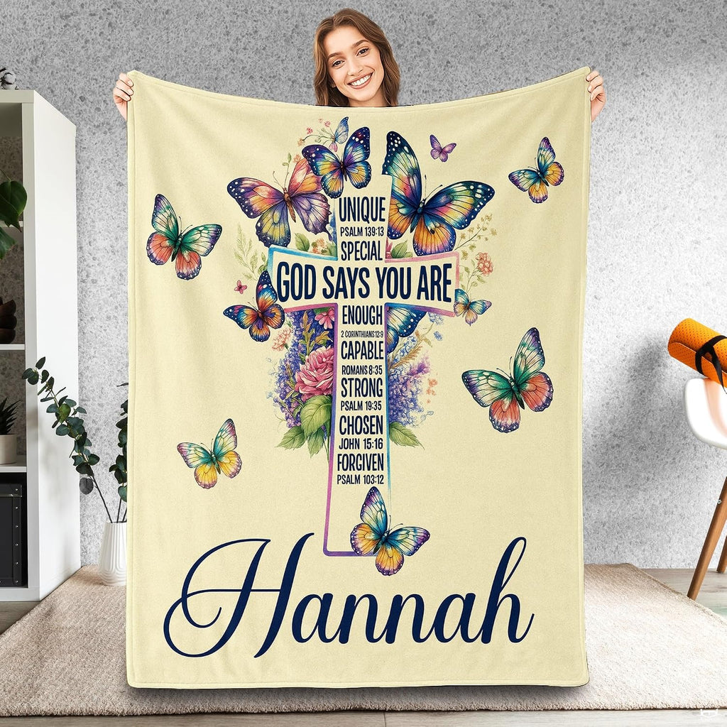Whimsigoth bedding featuring an ornate floral cross with watercolor butterflies on light cream.