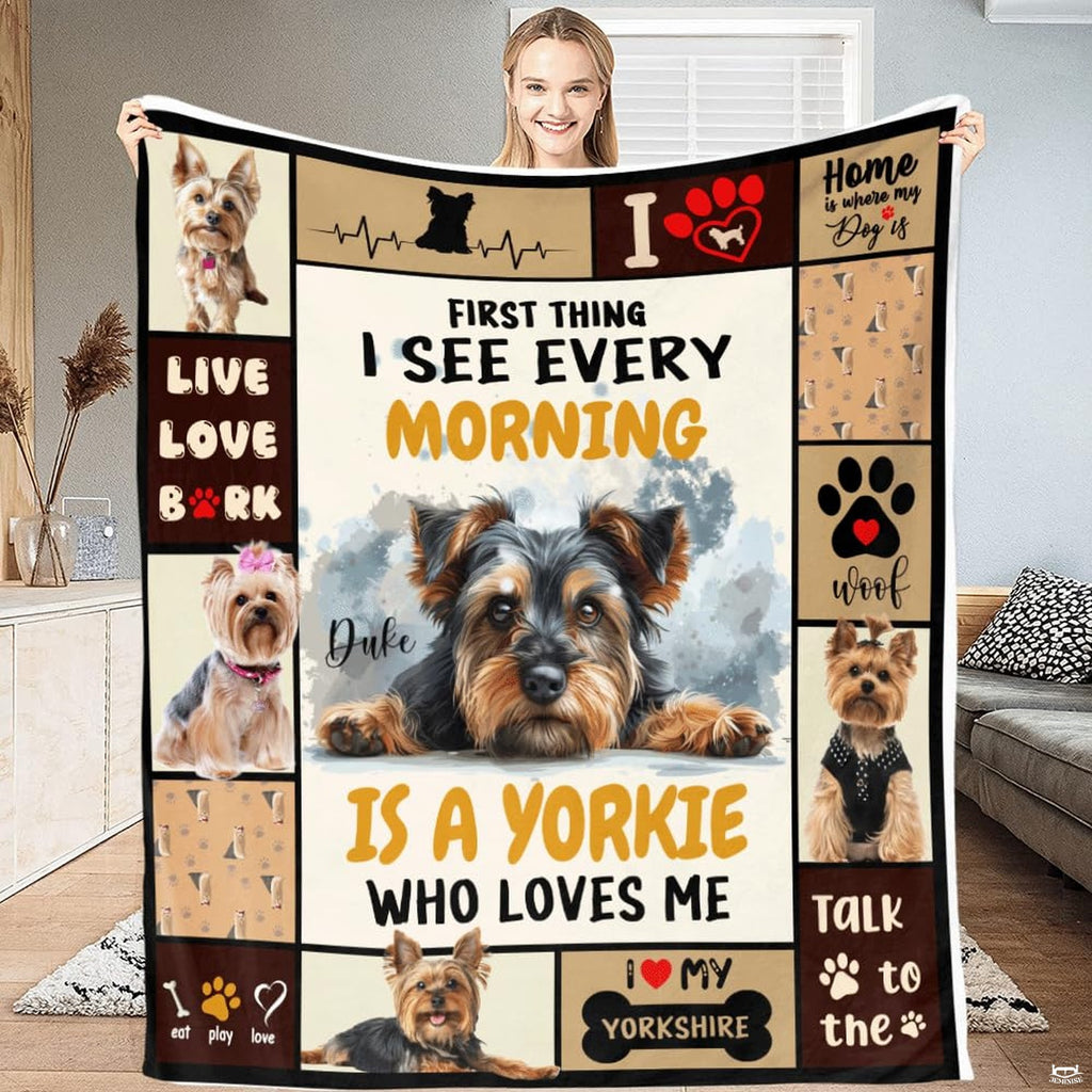 Full view of Yorkshire Terrier collage blanket held up indoors.