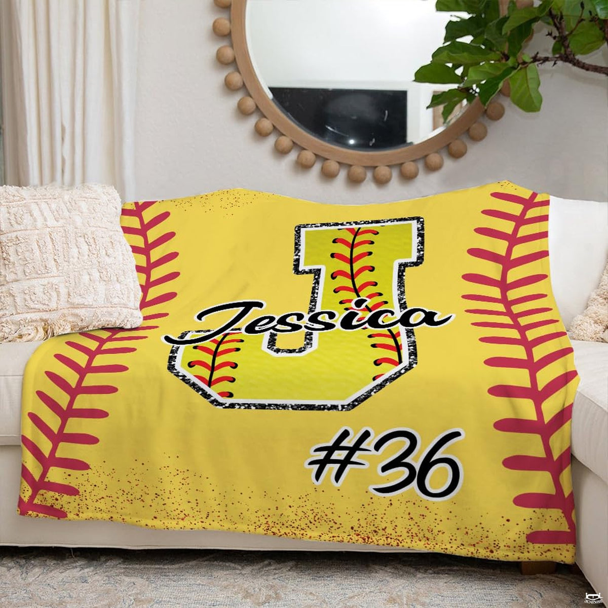 Yellow softball sports blanket spread smoothly across bedroom bed