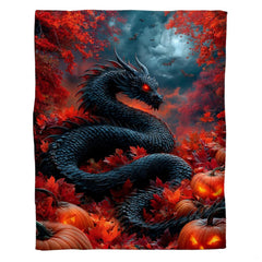 Gothic dragon Halloween throw blanket draped across living room sofa