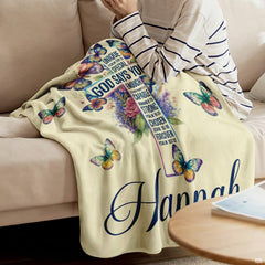 Detailed view of vibrant watercolor butterflies and blooming botanical cross motif.
