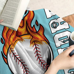 Flaming fireball baseball with fiery trails against sky blue backdrop, view 4.