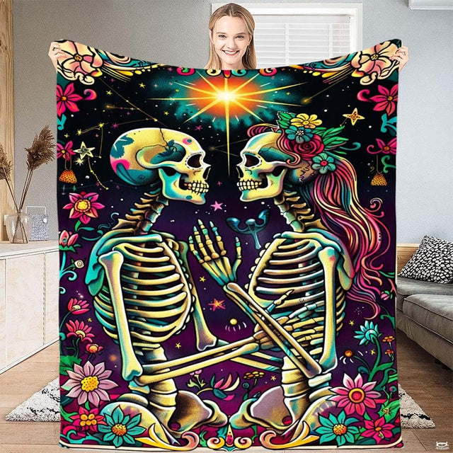 Sugar skull skeleton lovers celestial star throw blanket held open by woman