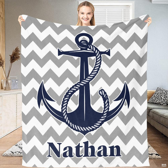Nautical anchor bedding set featuring a navy rope anchor over a gray and white chevron zigzag pattern background.