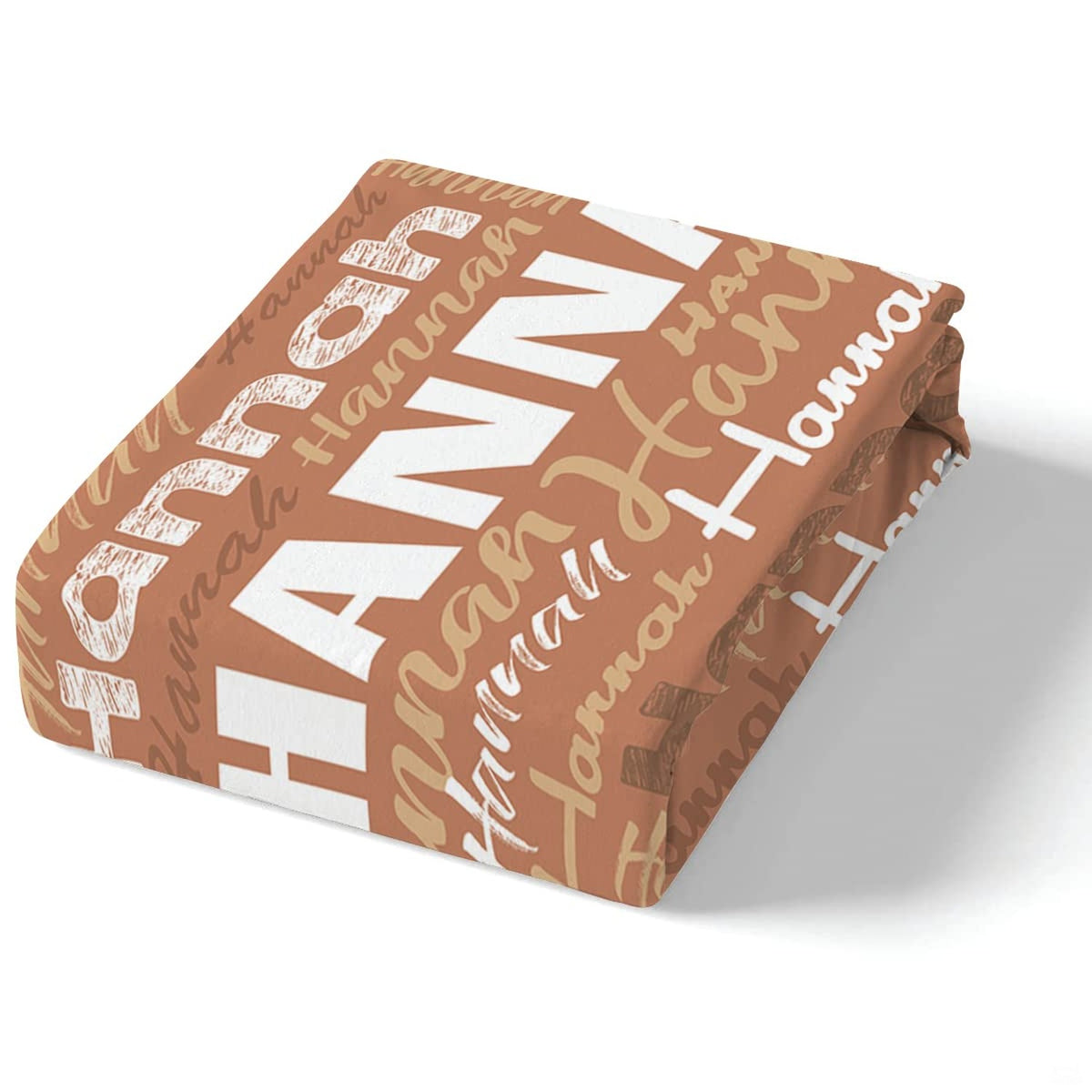 Corner fold view of typography bedding highlighting sharp terracotta and white graphic printing