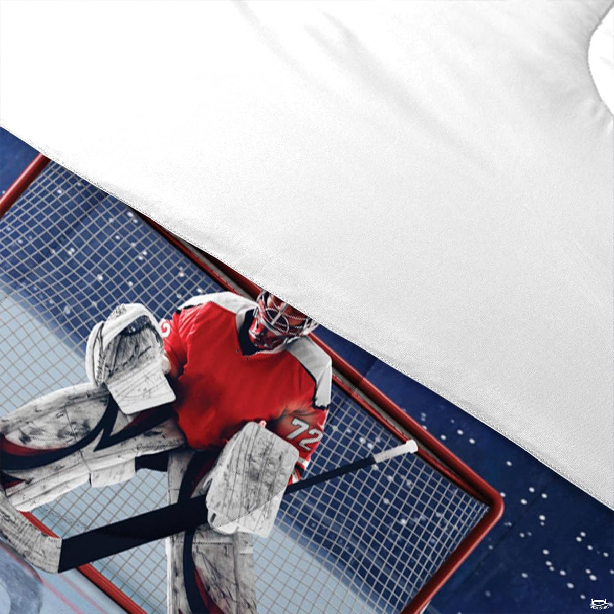 Folded presentation of ice hockey bedding displaying sharp graphic clarity in royal blue and red tones