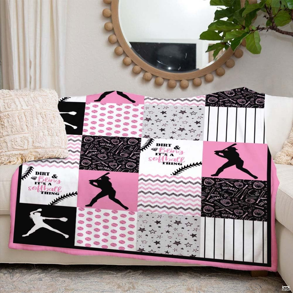 Fastpitch athlete patchwork textile laid flat showing pink and black tiles
