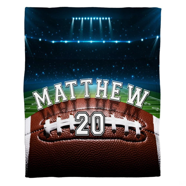 Football field stadium throw blanket view 2 highlighting textured football, green turf, and arena floodlights