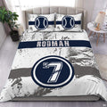 White and forest green baseball athletic sports bedding set displayed on a bed in a modern room