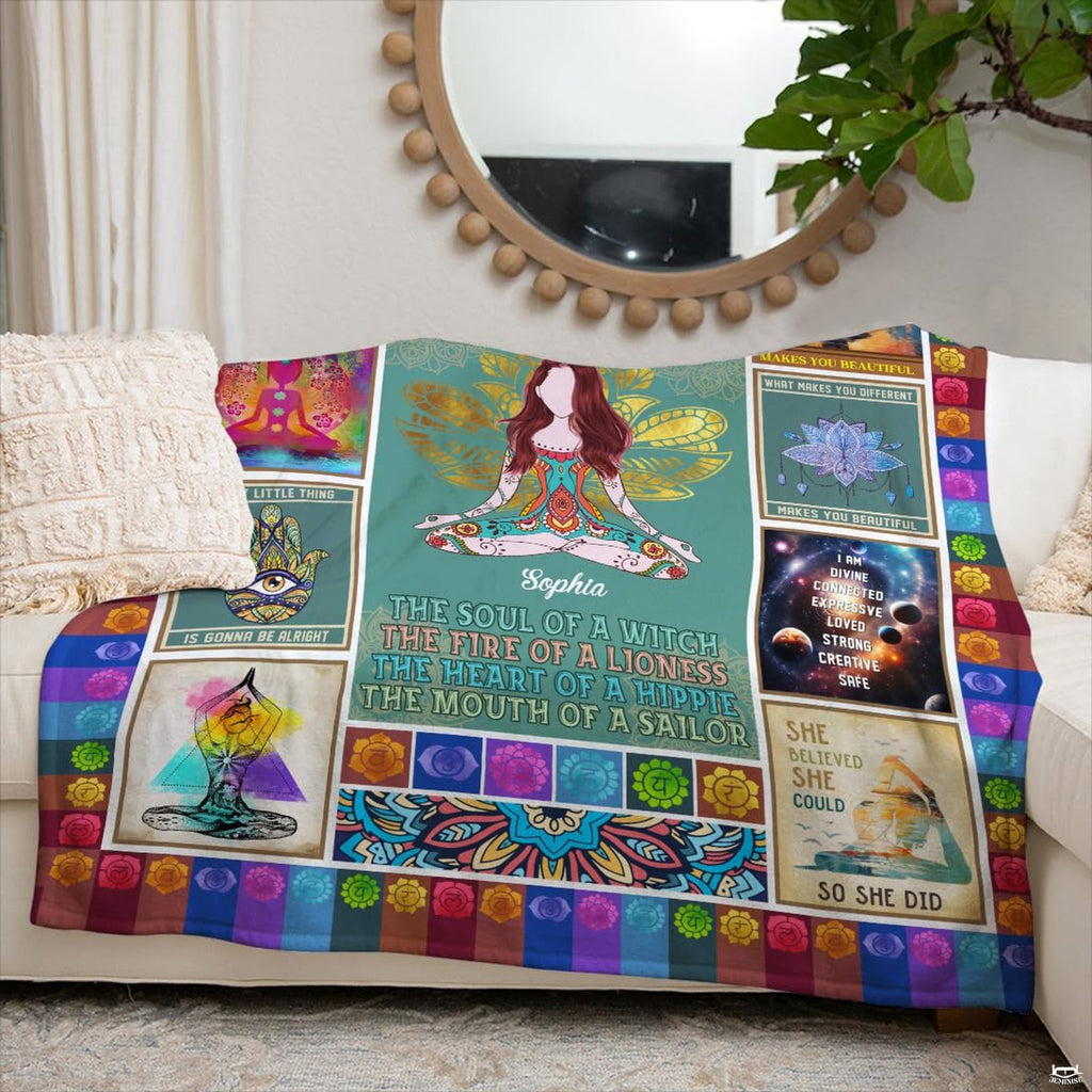 Living room sofa display showing the colorful chakra meditation throw blanket draped over furniture.