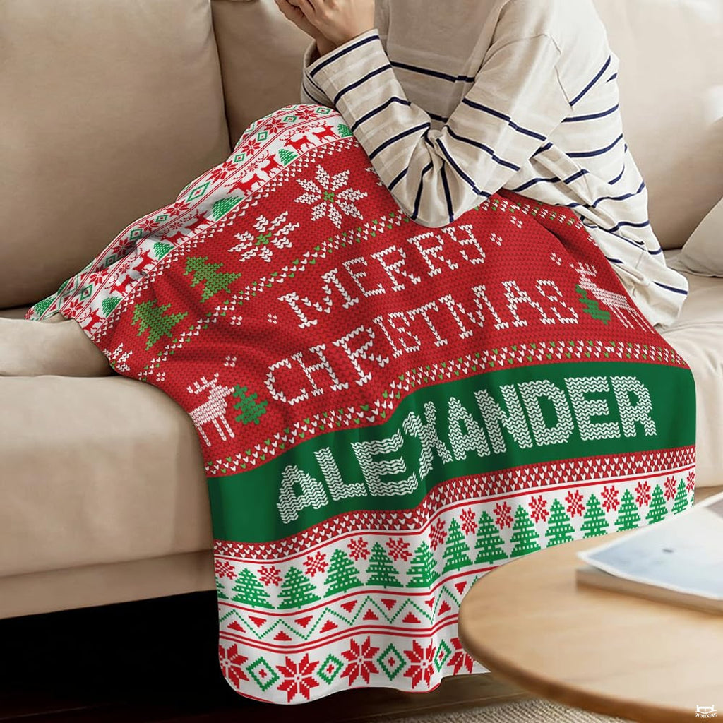 Close view of pixelated reindeer and Fair Isle snowflake rows on blanket