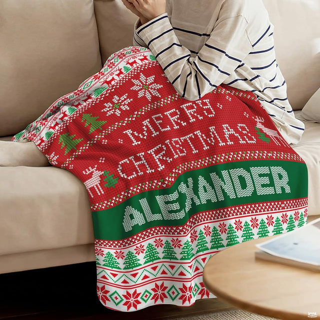 Close view of pixelated reindeer and Fair Isle snowflake rows on blanket