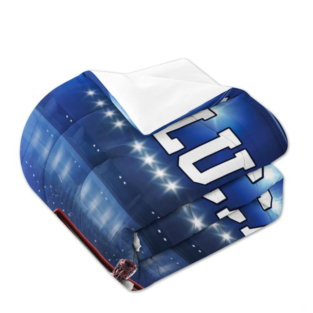 Matching pillowcase detail for hockey bedding set showing coordinating sticks, pucks, and goalie helmet art