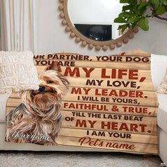 Folded presentation of the rustic pup throw blanket resting neatly on an armchair.