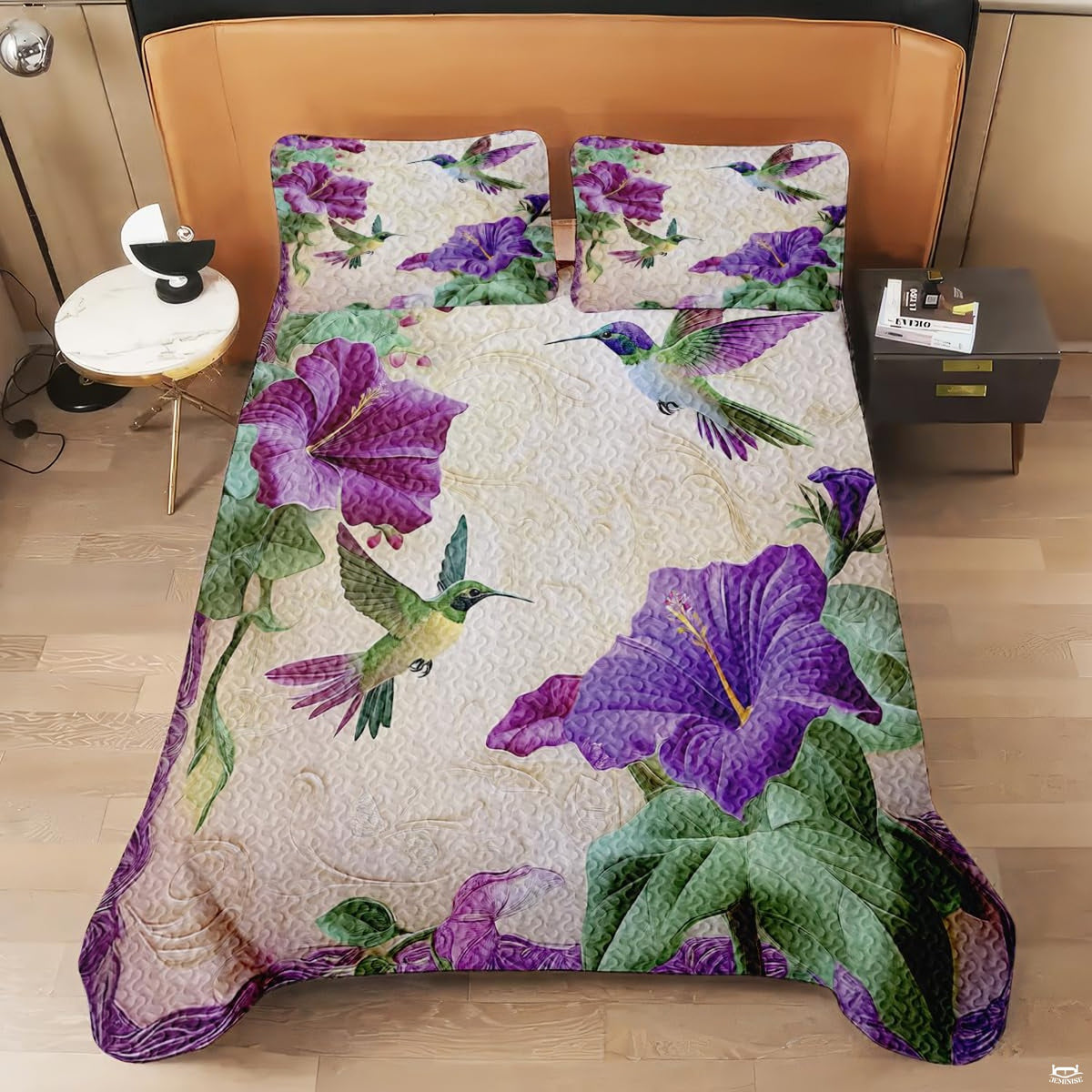 Violet hummingbird bedding shown on a modern bed
