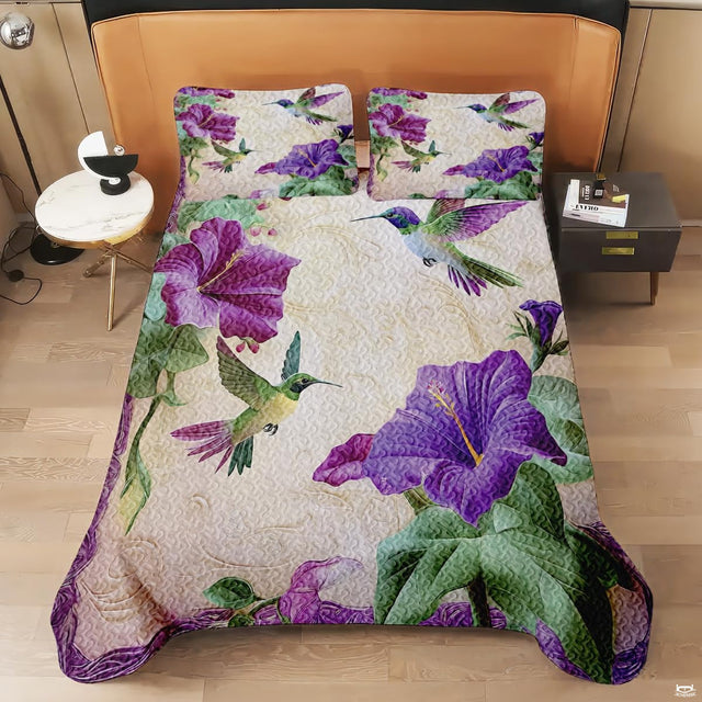 Violet hummingbird bedding shown on a modern bed
