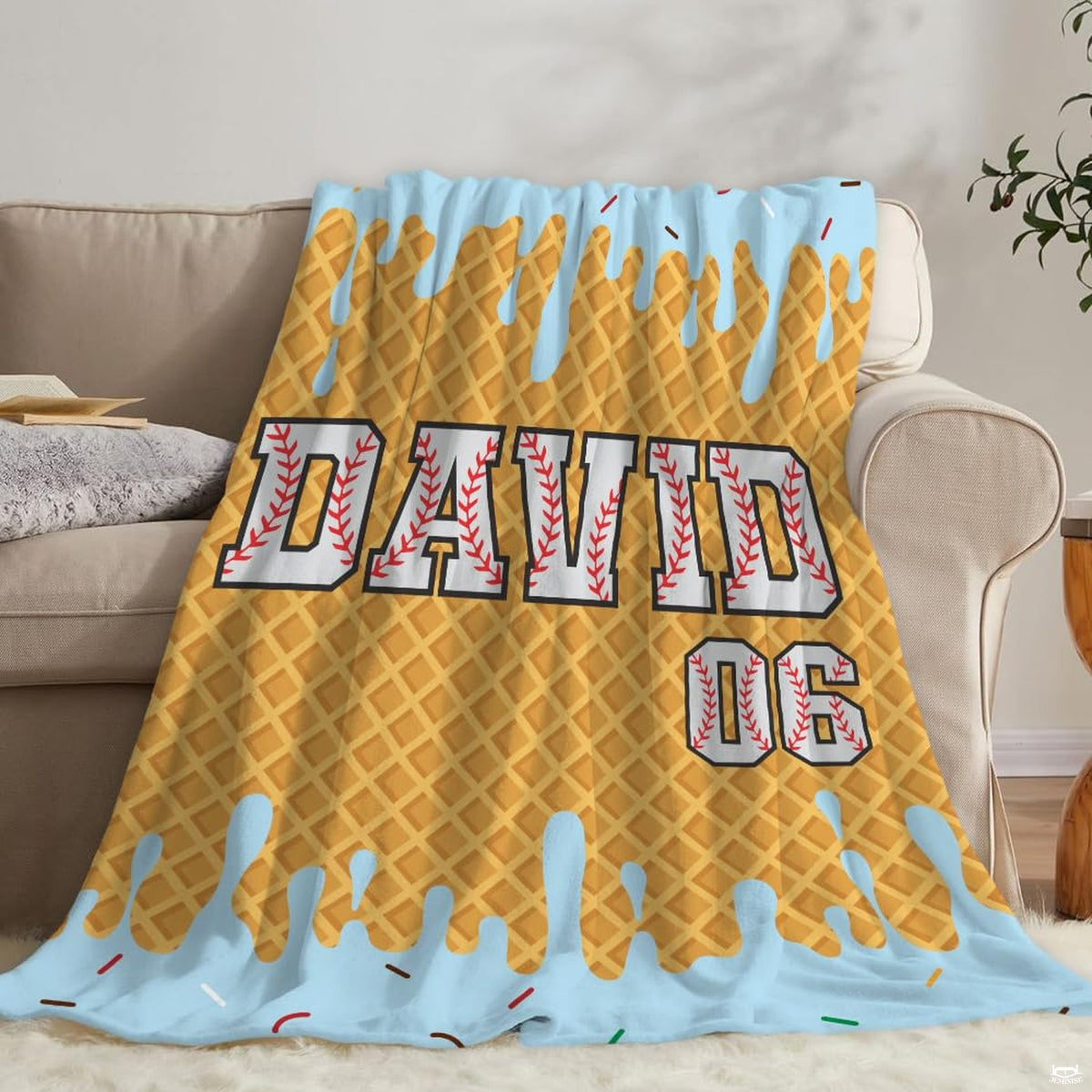 Angle view of playful waffle ice cream sandwich bedding highlighting amber waffle cone grid artwork.