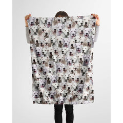 Dogo Argentino dog lover throw blanket styled across a couch in a living room.