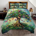 Butterfly tree of life bedding set featuring an ornate botanical tree and winged butterflies in sage green patchwork tiles.