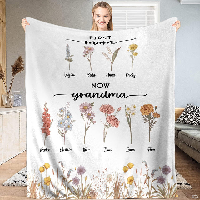 Person presenting the birth month flowers design with wildflower meadow border.
