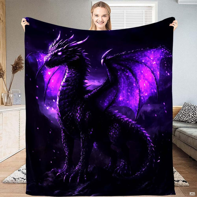 Close-up view of purple galaxy dragon throw blanket highlighting vivid nebula wing details and scaled texture.