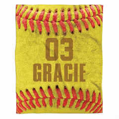 Front full perspective of macro softball throw blanket showing close-up yellow ball and red laces