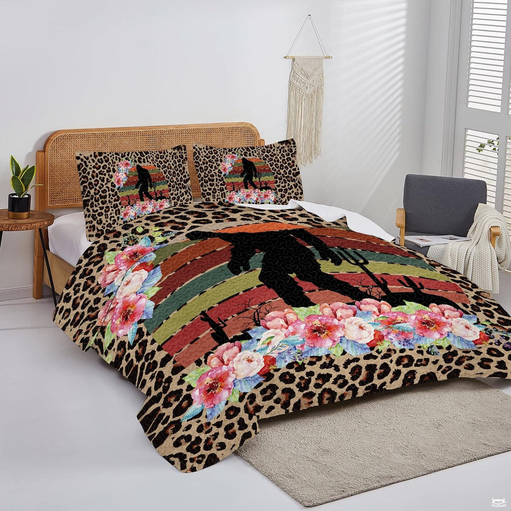 Overhead view of wild cheetah Bigfoot bedding arranged neatly across a decorative bedroom mattress