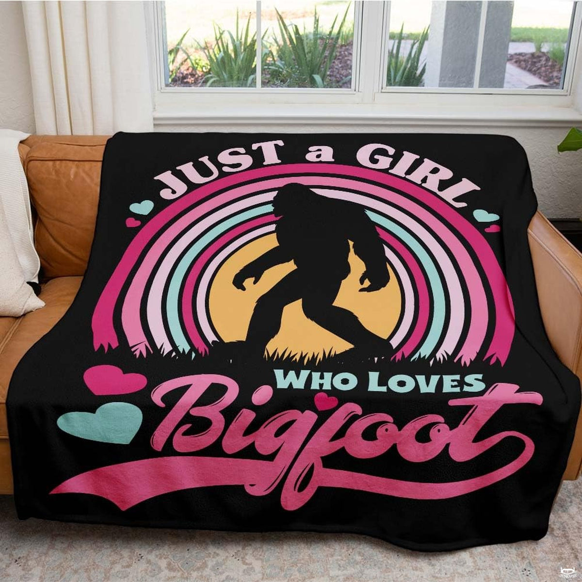 Pastel rainbow arch framing Bigfoot silhouette with hearts and typography on black, view 3.