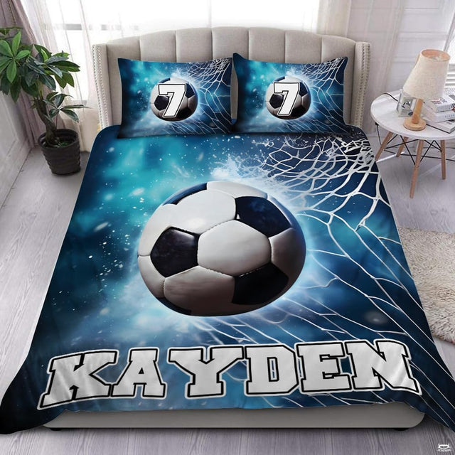 Ocean teal and ice blue soccer sports bedding featuring a soccer ball graphic with aquatic ripples on a bed