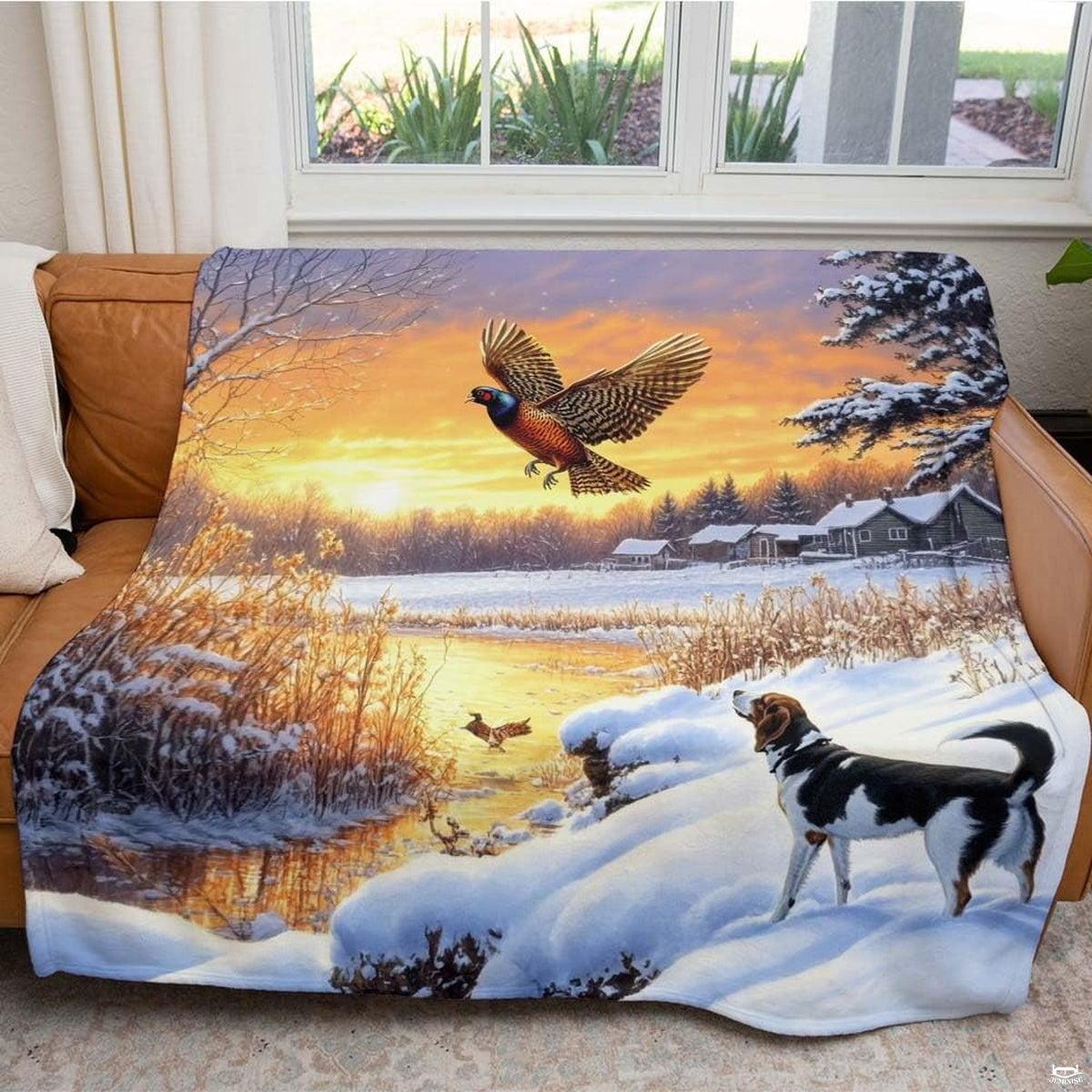 Detailed view of flying ring-necked pheasant artwork over frozen stream on winter themed bedding.