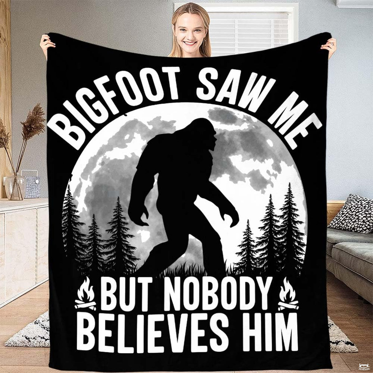 Nocturnal Bigfoot pine forest throw blanket featuring Sasquatch silhouette under full moon with campfire icons
