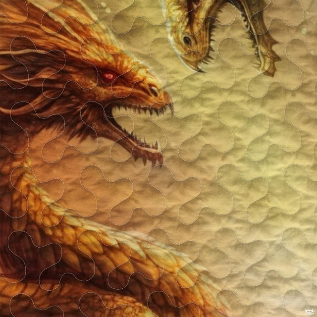 Close-up of orange dragon head with teeth and mane-like spines
