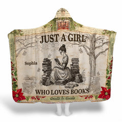 Hooded throw blanket displaying vintage reader girl, book stacks, tree, and poinsettia borders.