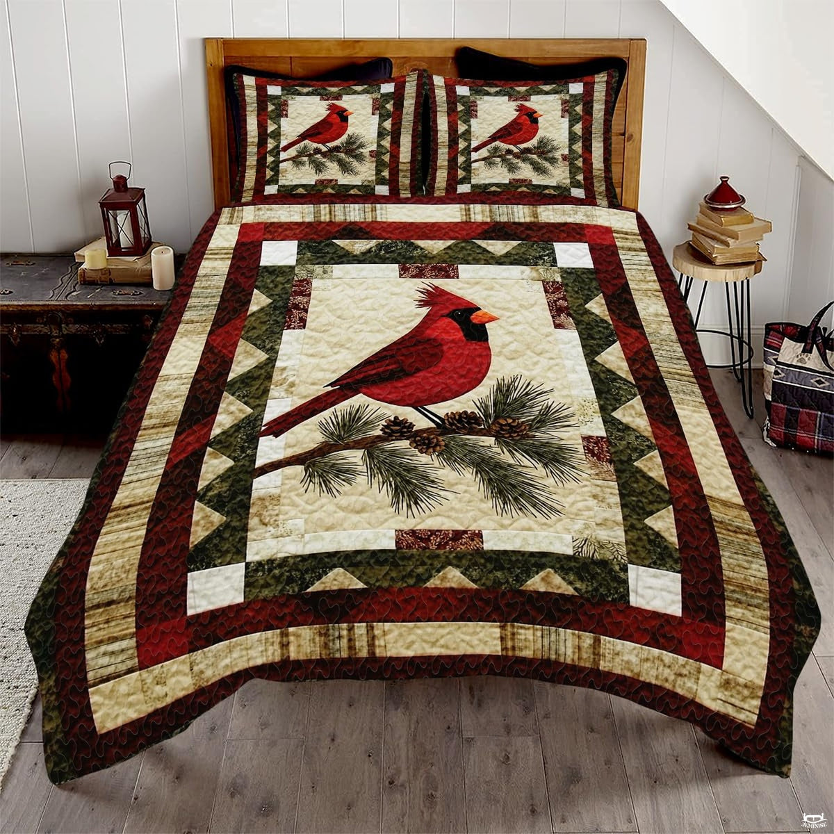 Vintage winter cardinal red bird patchwork bedding set displayed neatly on a bed in a rustic bedroom