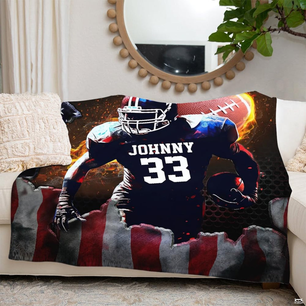 Patriotic football throw blanket view 3 highlighting runner bursting through American flag with blazing ball