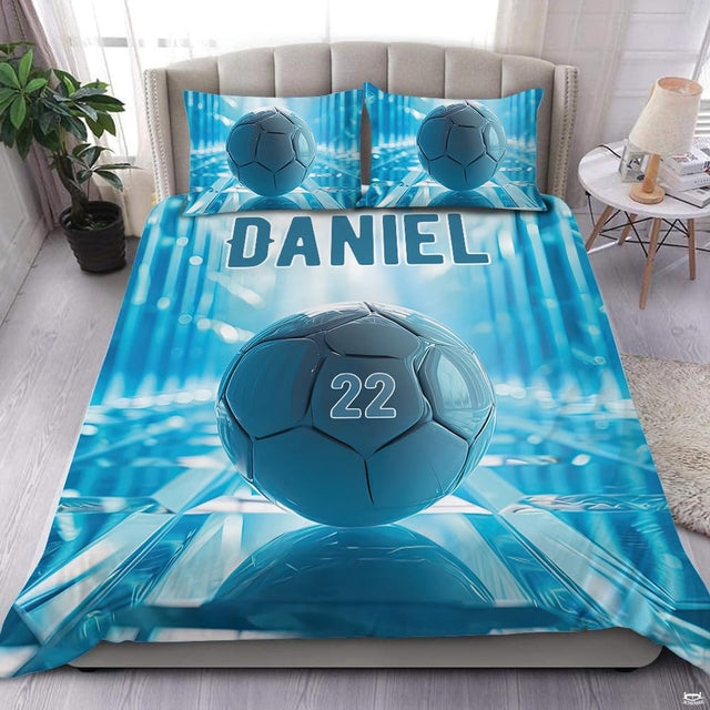 Boys soccer bedding set featuring a metallic cyan soccer ball on a futuristic reflective grid.