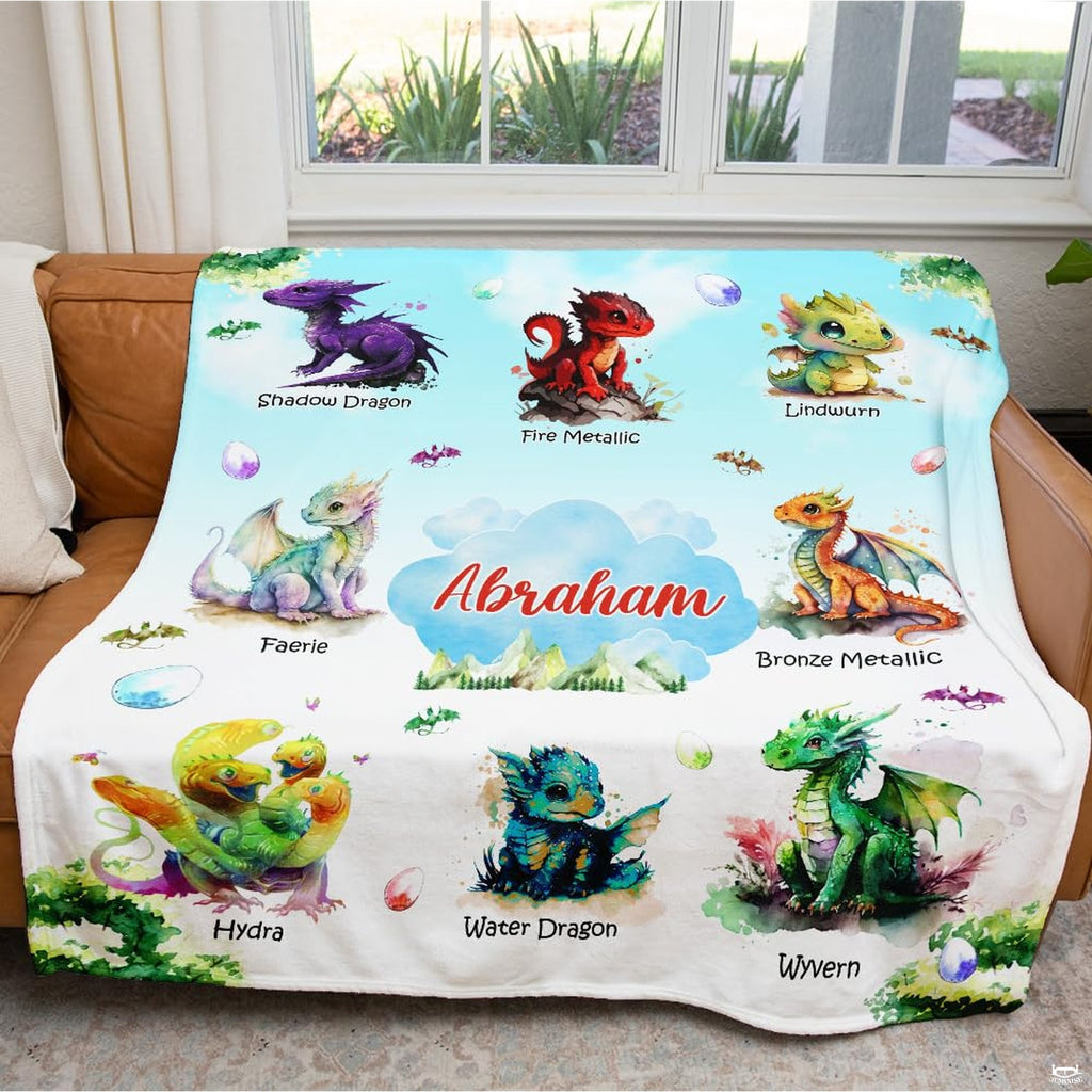 Close-up perspective of colorful dragon hatchling illustrations and eggs on fantasy throw blanket