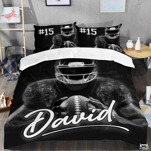 Perspective bedroom view of monochrome football player sports bedding set on bed.