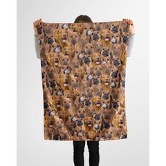Rhodesian Ridgeback photo collage blanket styled across a couch in a bright room.