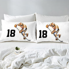 Side angle view of athletic winter sports bedding showing bronze amber and charcoal tones on mattress