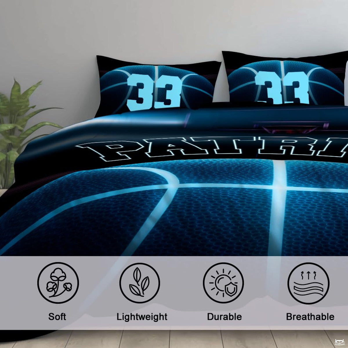 Corner fold view of basketball bedding highlighting vivid neon cyan printing against deep black background