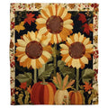 Autumn sunflower harvest throw blanket with ripe pumpkins, corn ears, and berry vine border on midnight ground