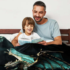 Neatly folded teal dragon throw blanket displaying clean stitched hems and compact presentation.