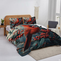 Overhead display of winter cardinal bedding arranged neatly over a mattress in a bright bedroom
