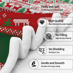 Red and green Christmas graphic blanket displayed on living room sofa