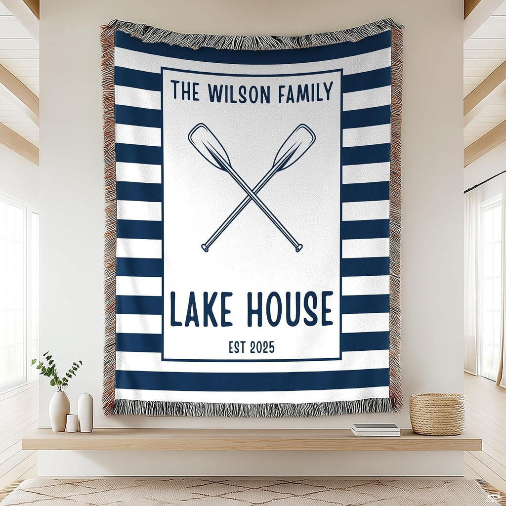 Cabin bedding sets featuring crossed canoe paddles and bold navy stripes.