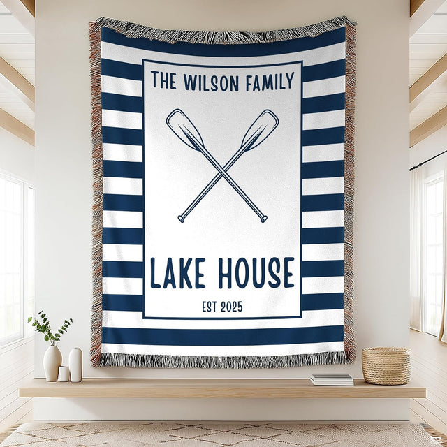 Cabin bedding sets featuring crossed canoe paddles and bold navy stripes.