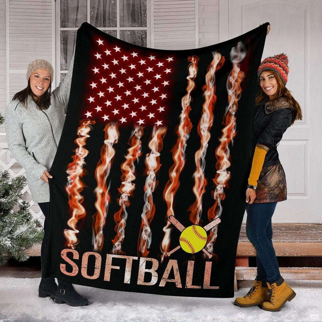 Two friends displaying the fiery athletic graphic outdoors in snowy winter conditions.